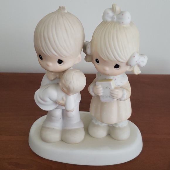 Precious moments family figure